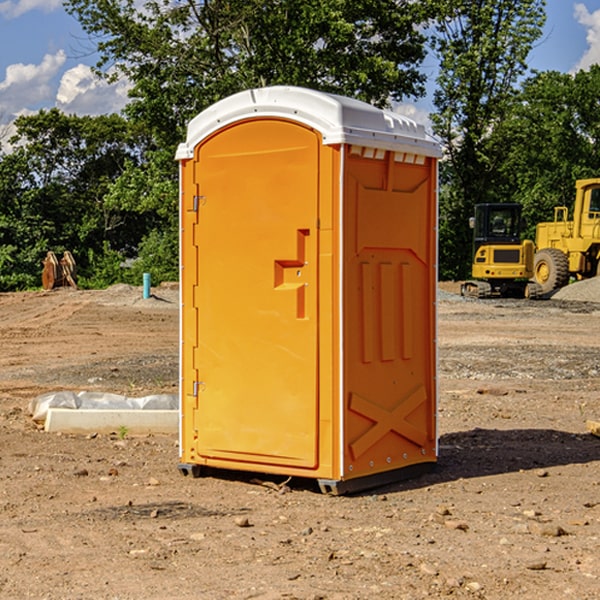 how often are the portable restrooms cleaned and serviced during a rental period in Mina